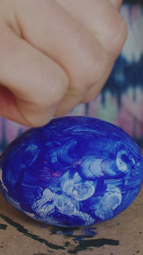 Blue easter egg with glitter.