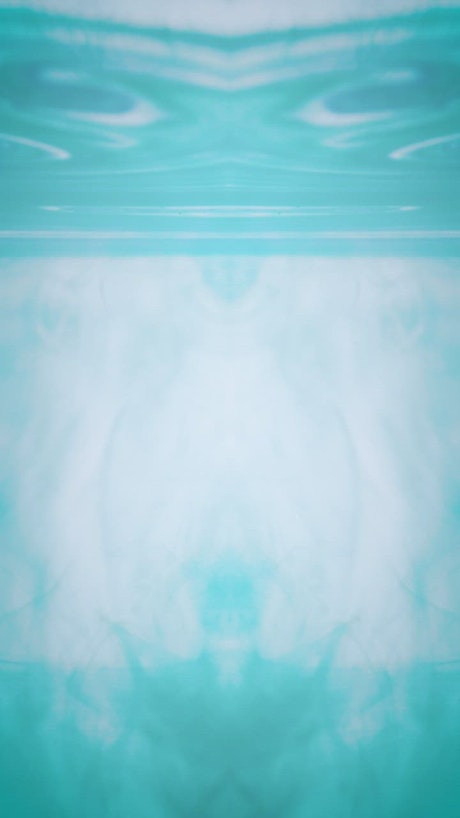 Blue ink texture underwater with a mirror.