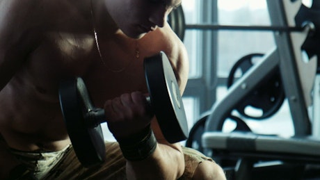 Bodybuilder training at the gym.