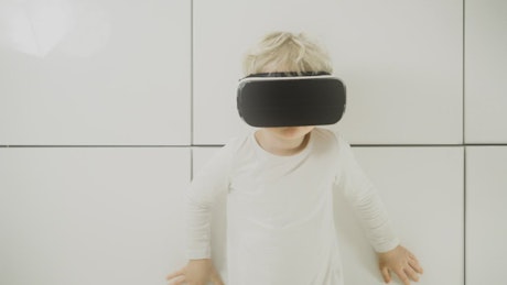 Boy watching a video in VR
