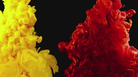 Bright red and yellow liquid forms