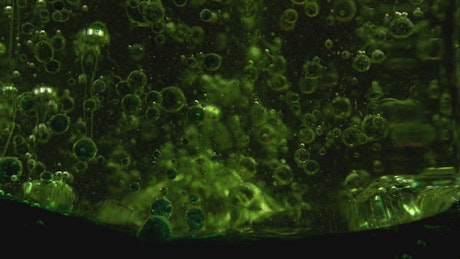 Bubbly abstract green liquid