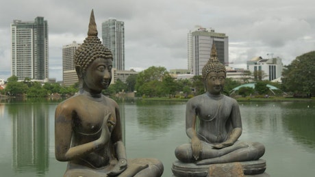 Buddhism statues in a lake