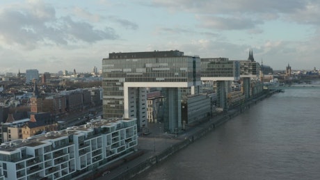 Buildings with modern architecture by the river.