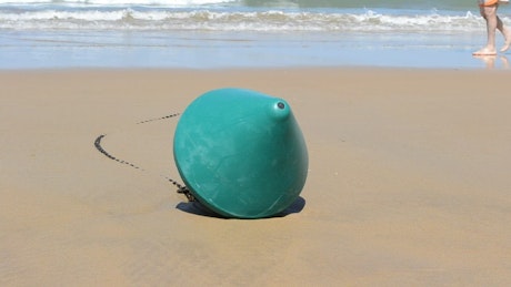 Buoy washed up on the beach.