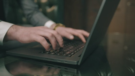 Businessman using laptop.