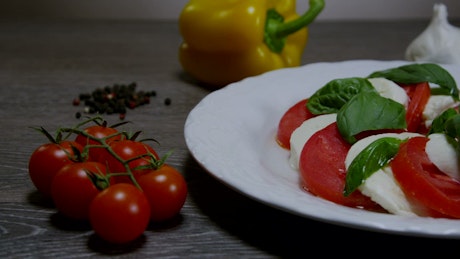 Caprese salad with oil and garlic.