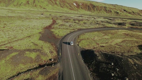 Car driving over wild roads.
