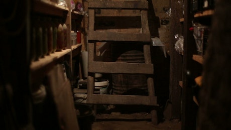 Cellar basement with jars of preserves.