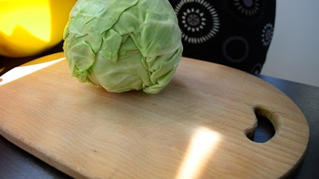 Chef slicing cabbage
