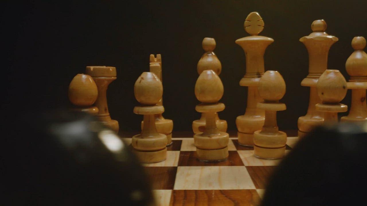 Browse Free HD Images of Chess Pieces In Focus On A Wooden Chess Board