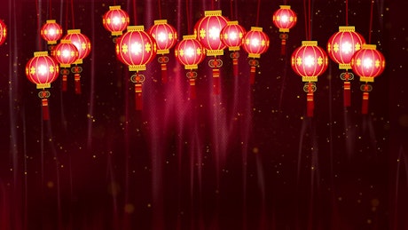 Chinese Lantern Lights hanging on a red background.