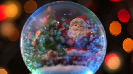 Christmas santa sphere with bokeh background
