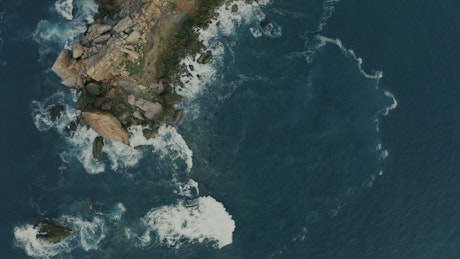 Cliffs in the sea aerial shot.