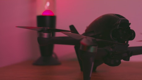 Close shot of a drone on a table.