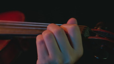 Close shot of a violinist playing.