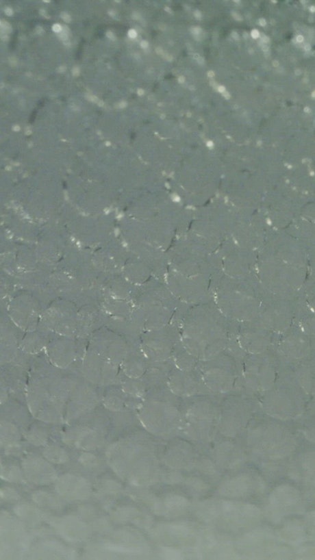 Close texture of bubbles of a gaseous liquid.
