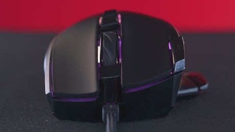 Close up of a gaming mouse with RGB lighting