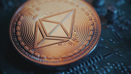 Close up of an Ethereum coin.