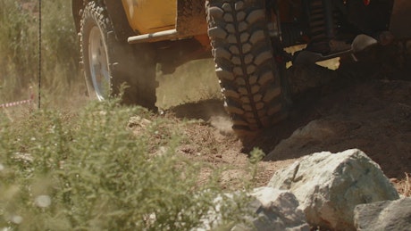 Close up of the tyres of an off road SUV.