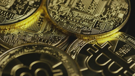 Close-up shot of a stack of bitcoins.