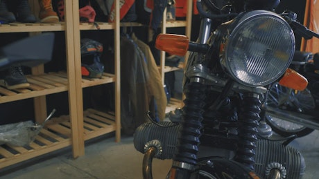 Close-up view of parked motorcycles in a workshop