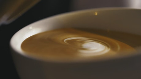 Close up view, serving a sparkling cappuccino.