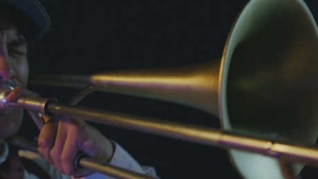 Close view of a musician playing the trumpet