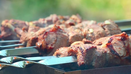 Closeup of meat in the grill.
