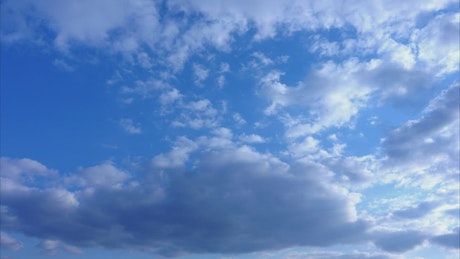 Clouds across a blue sky