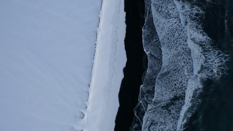 Coast on a frozen pole seen from the air.