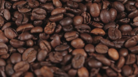 Coffee beans falling in reverse.
