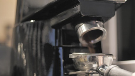 Coffee maker making coffee