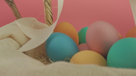 Colored easter eggs in two baskets
