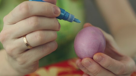 Coloring Easter Eggs.