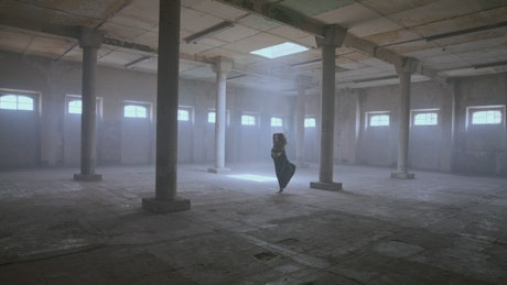 Contemporary dance in an abandoned place.