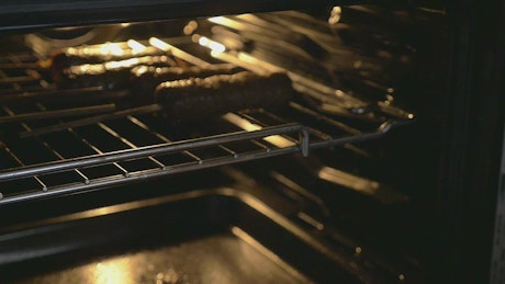 Cooking a kebab in an oven.