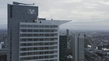 Corporate buildings overhanging the city