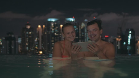 Couple having a video call on holiday.