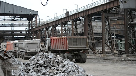 Crane operating in a metalworks