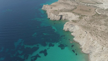 Crystal clear water coast seen from the air.