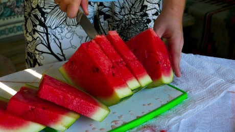 Cutting a watermelon with a knife
