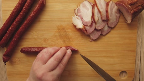 Cutting up sausage