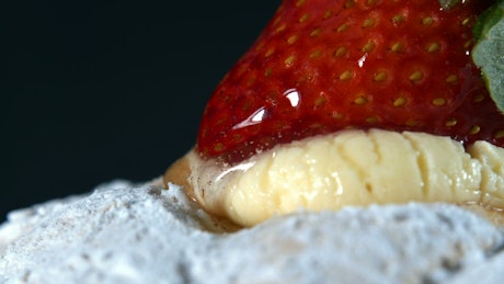 Delicious strawberry dessert in detail, macro shot.
