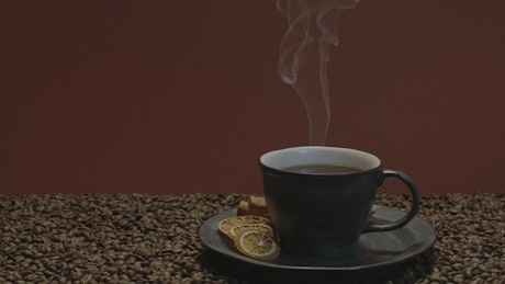 Demonstration video of a steaming cup of coffee.