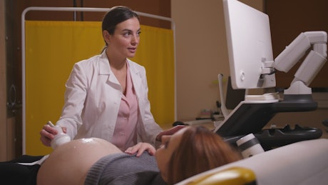 Doctor conducting an Ultrasound.