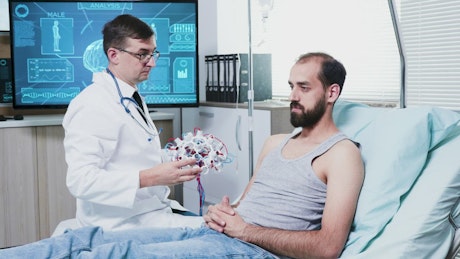 Doctor prepares patient for brain scan in hospital.