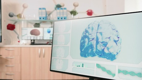 Doctor studies DNA models in futuristic medical office