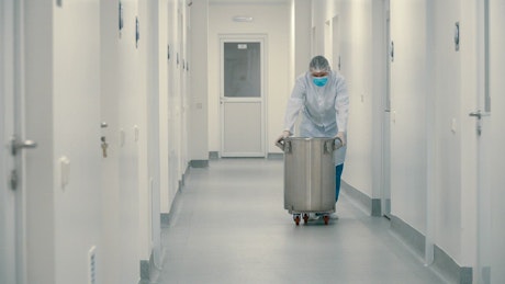 Doctor walking down a hospital hallway