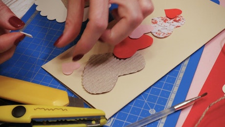 Doing a Valentines greeting card with paper cuts